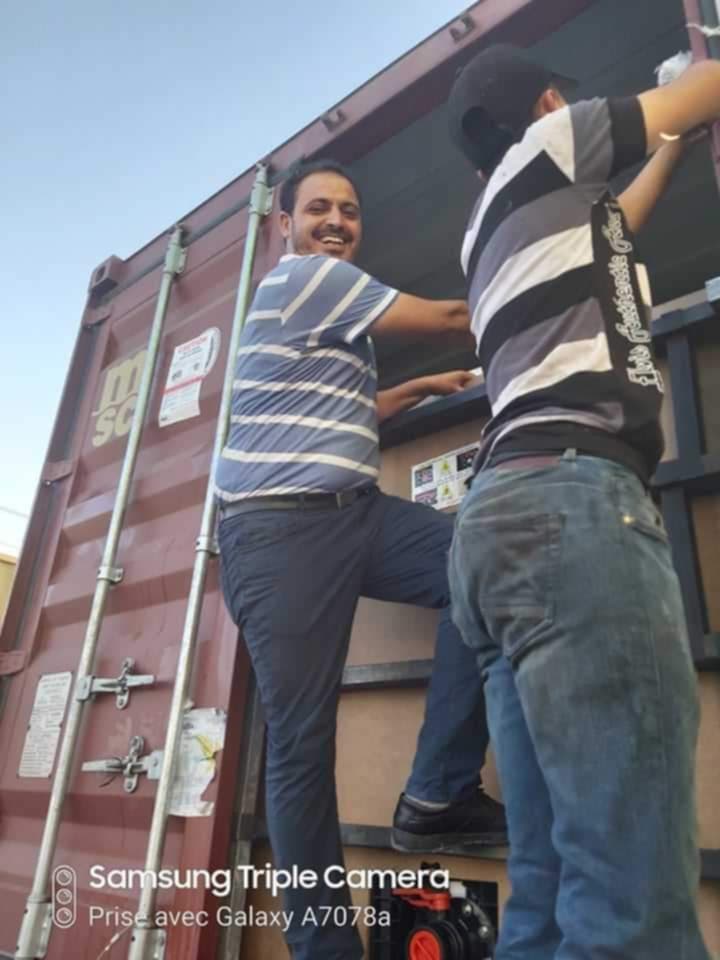 Team preparing an export container loading operation